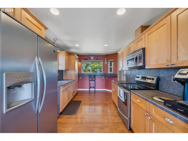 a kitchen with granite countertop lots of counter top space