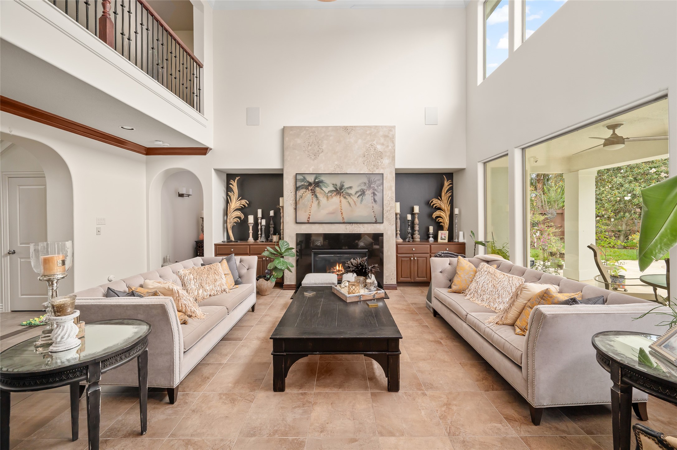 2127 Thicket Ridge Lane Houston, TX 77077 - Photo 11 of 48 Notice the custom faux painting that surrounds the gas fireplace.