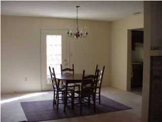 803 Valley Road, Unit 803 Crestview, FL 32539 - Photo 3 of 5 a view of a dining room with furniture