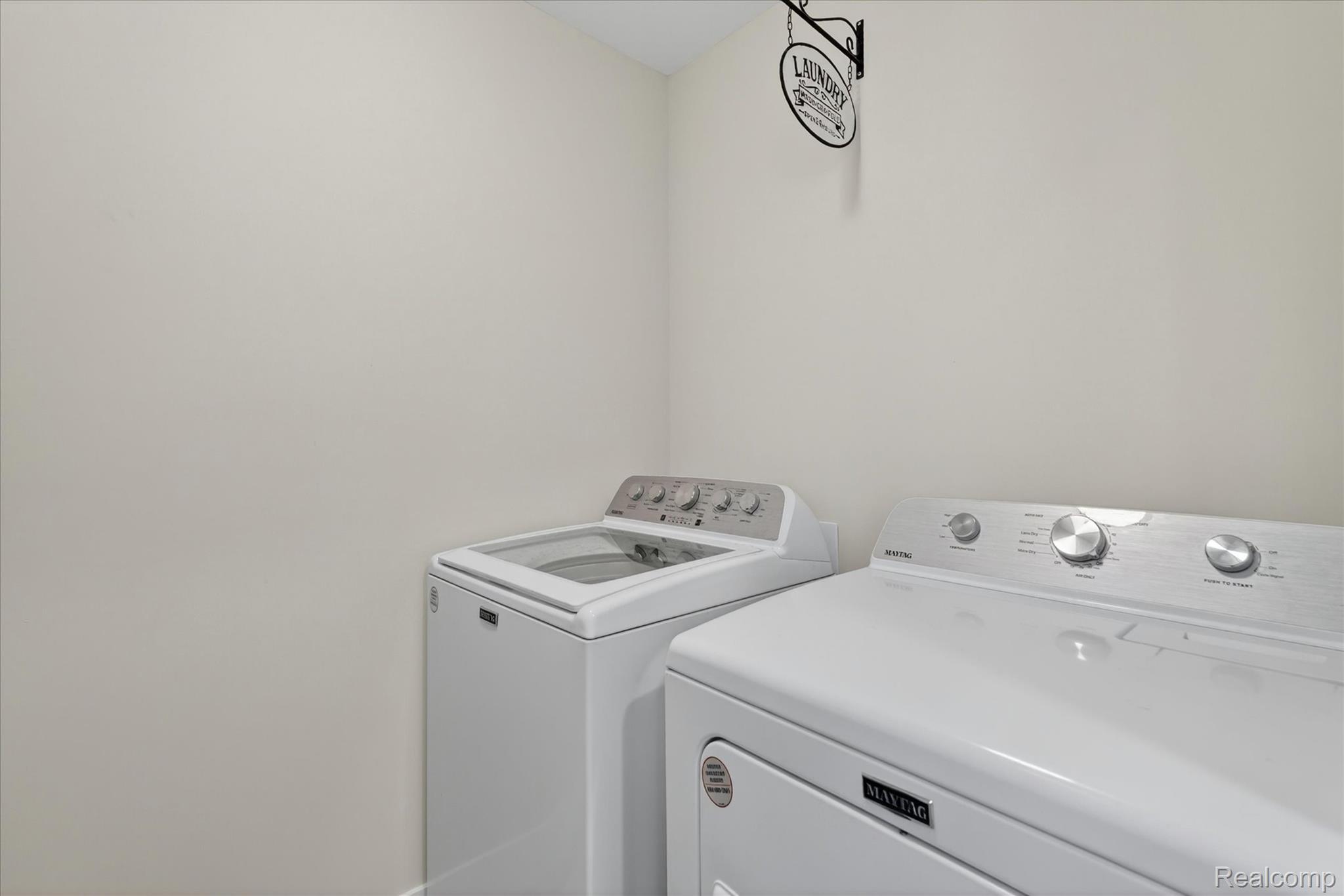 8130 Hinchey Road Pinckney, MI 48169 - Photo 35 of 62 Laundry room with washer and clothes dryer