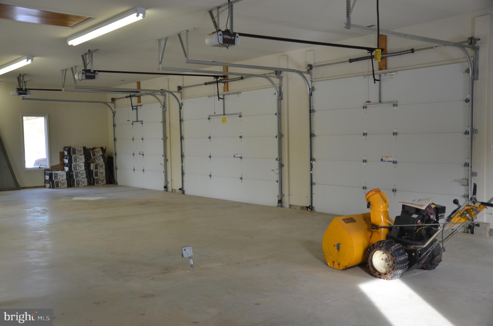 13733 Cuba Road Cockeysville, MD 21030 - Photo 53 of 82 Inside the garage you see the three garage doors