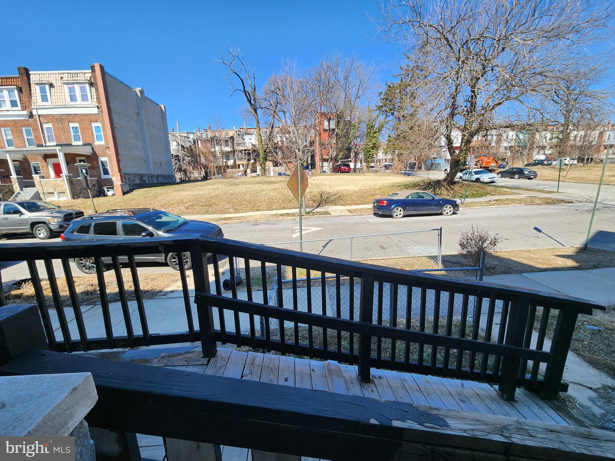 2217 Bryant Avenue Baltimore, MD 21217 - Photo 2 of 31 a view of a chairs and table on the deck