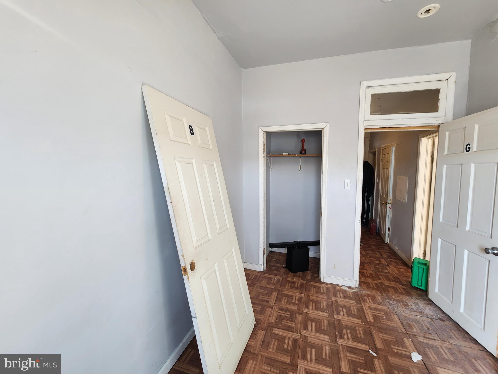 2217 Bryant Avenue Baltimore, MD 21217 - Photo 25 of 31 a view of a hallway with wooden floor and entryway