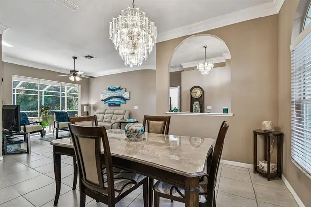 a kitchen with stainless steel appliances granite countertop a refrigerator stove and sink