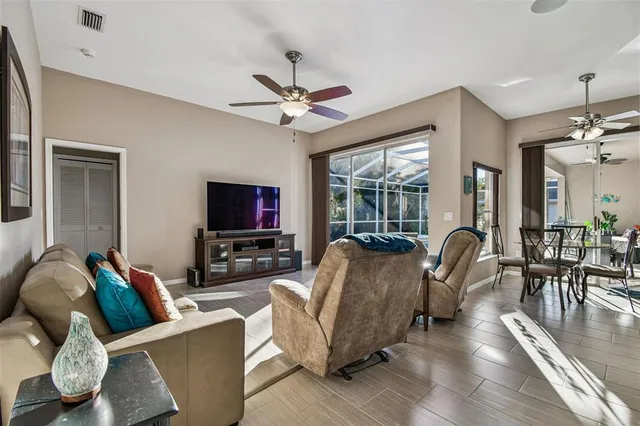 a bathroom with a double vanity sink toilet and shower
