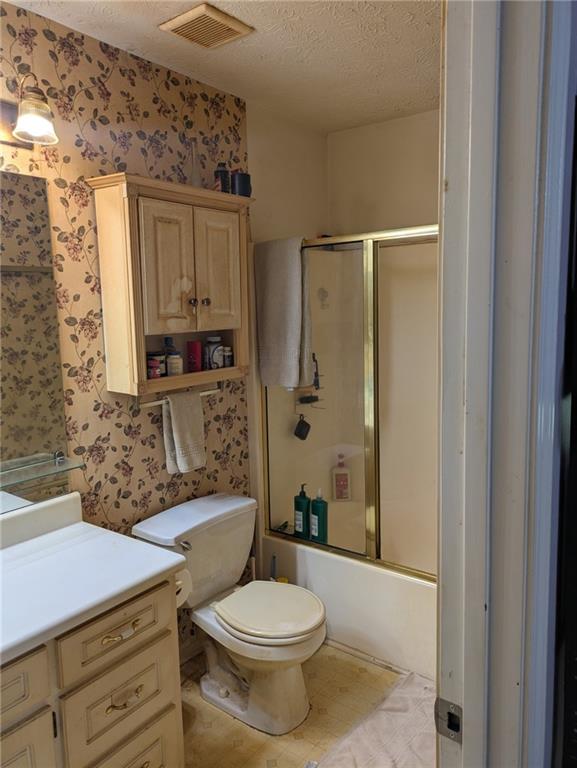 435 Red Oak Court Monroe, GA 30655 - Photo 16 of 28 a bathroom with a sink a toilet and shower