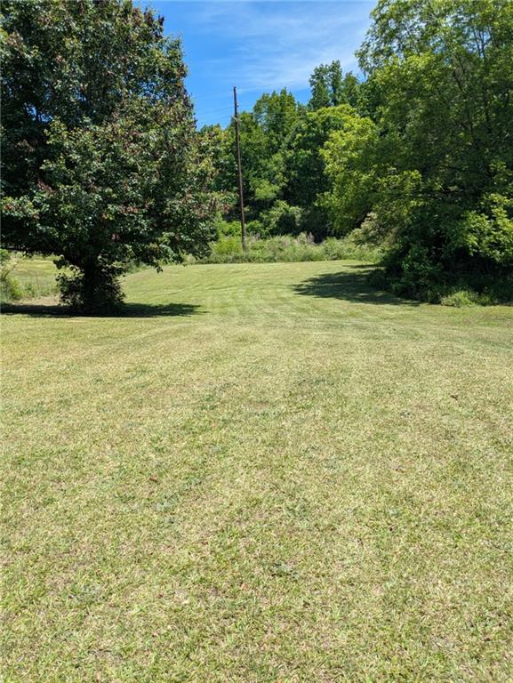 435 Red Oak Court Monroe, GA 30655 - Photo 23 of 28 a view of a field with an trees