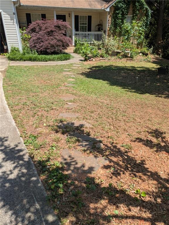 435 Red Oak Court Monroe, GA 30655 - Photo 3 of 28 a view of a backyard with plants