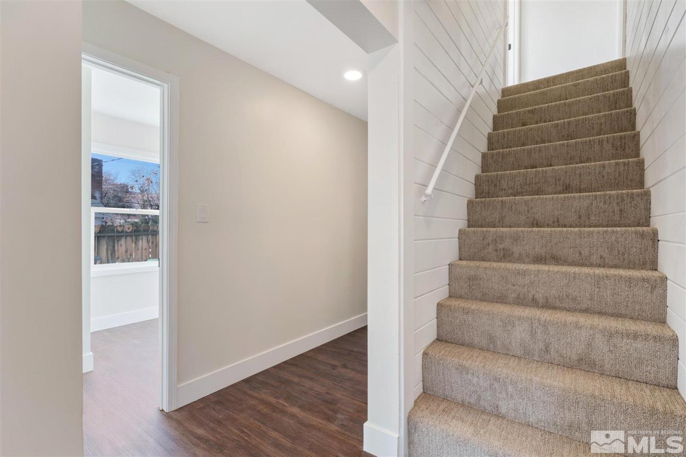289 Bartlett Street Reno, NV 89512 - Photo 15 of 40 a view of staircase with white walls