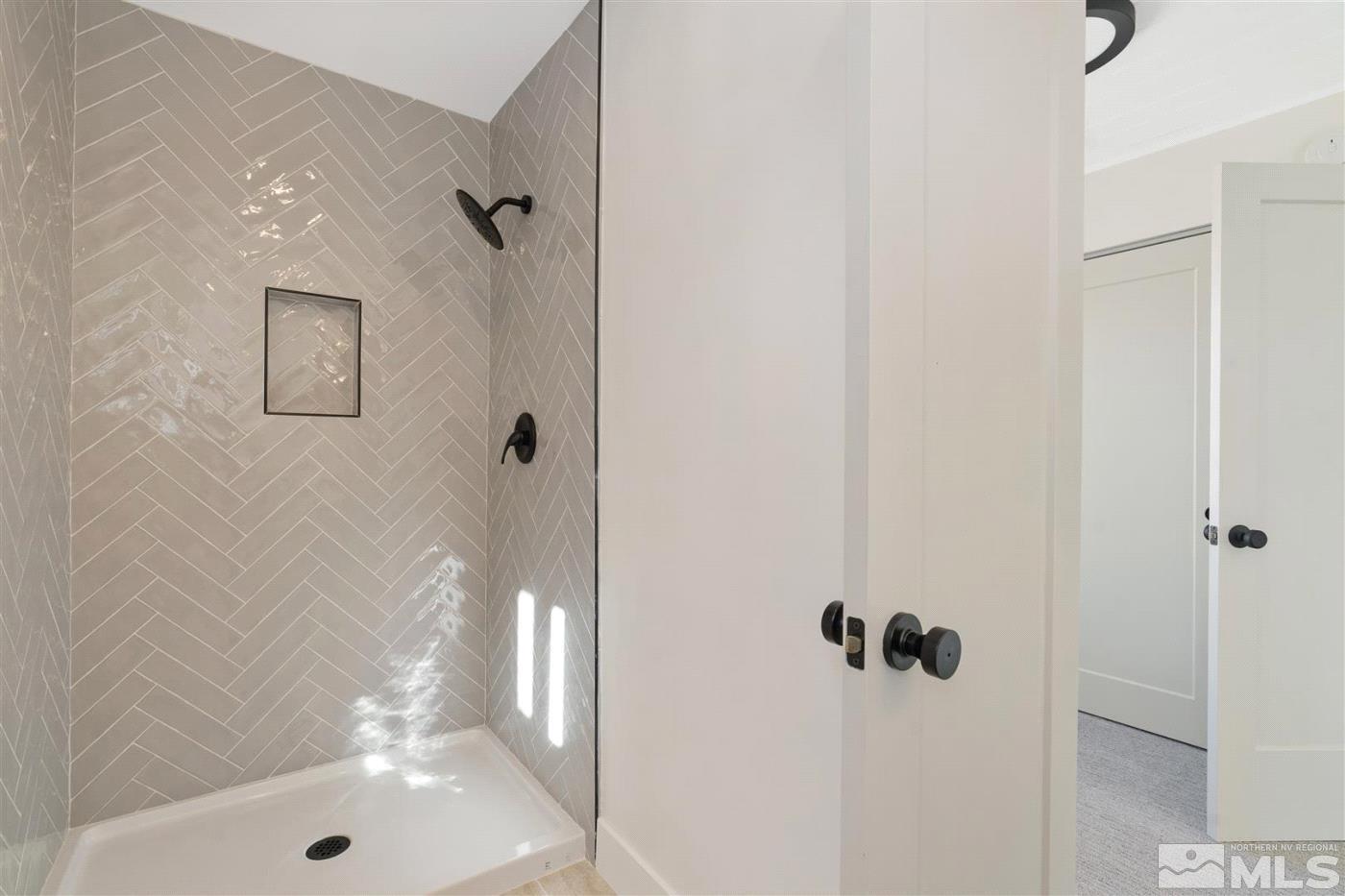 289 Bartlett Street Reno, NV 89512 - Photo 29 of 40 a bathroom with a shower