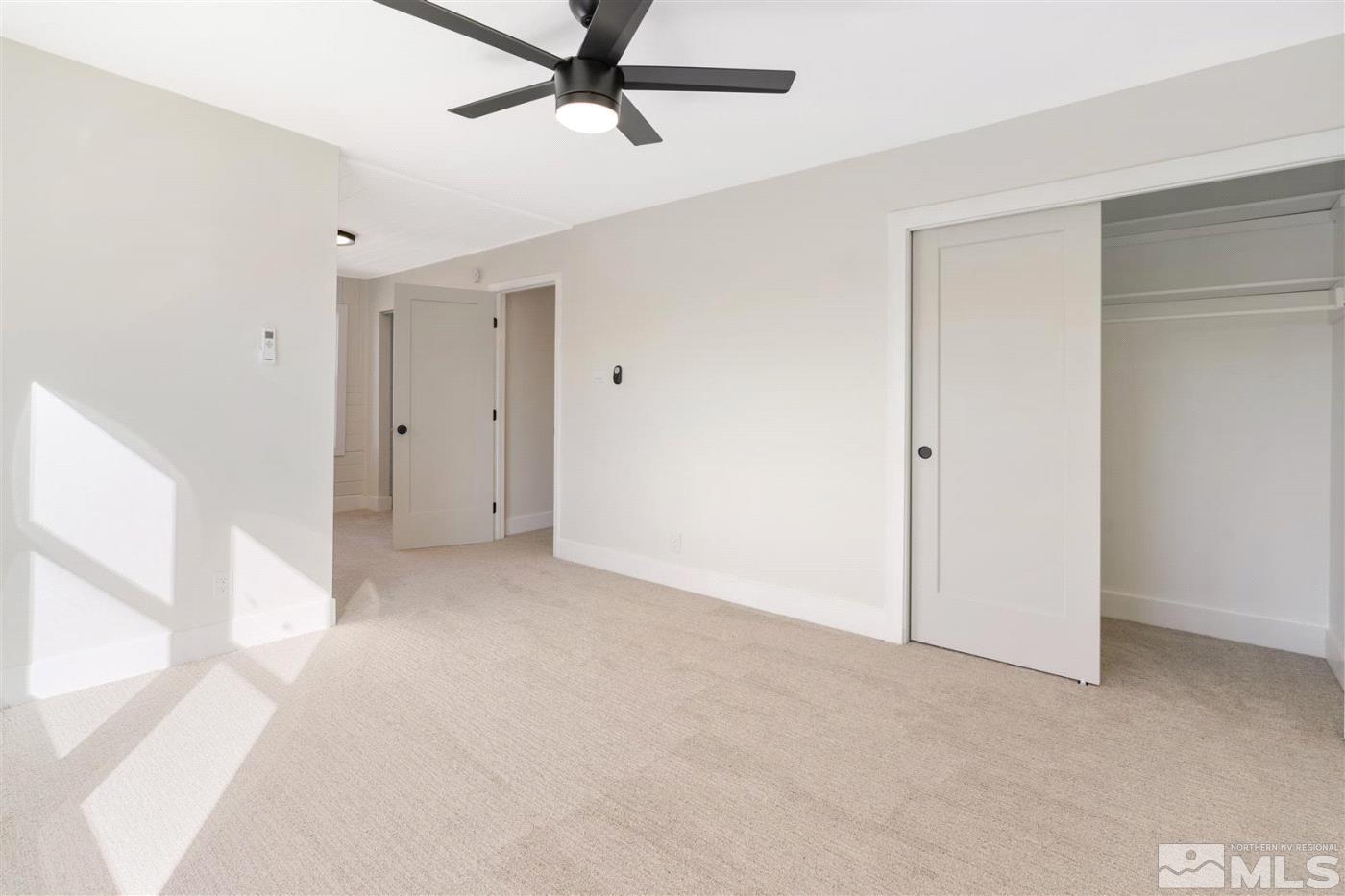 289 Bartlett Street Reno, NV 89512 - Photo 32 of 40 a view of a room with a ceiling fan