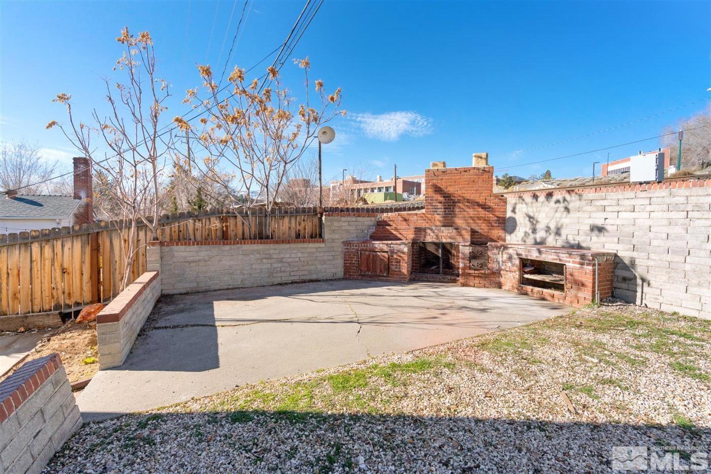 289 Bartlett Street Reno, NV 89512 - Photo 34 of 40 a view of a yard with cars