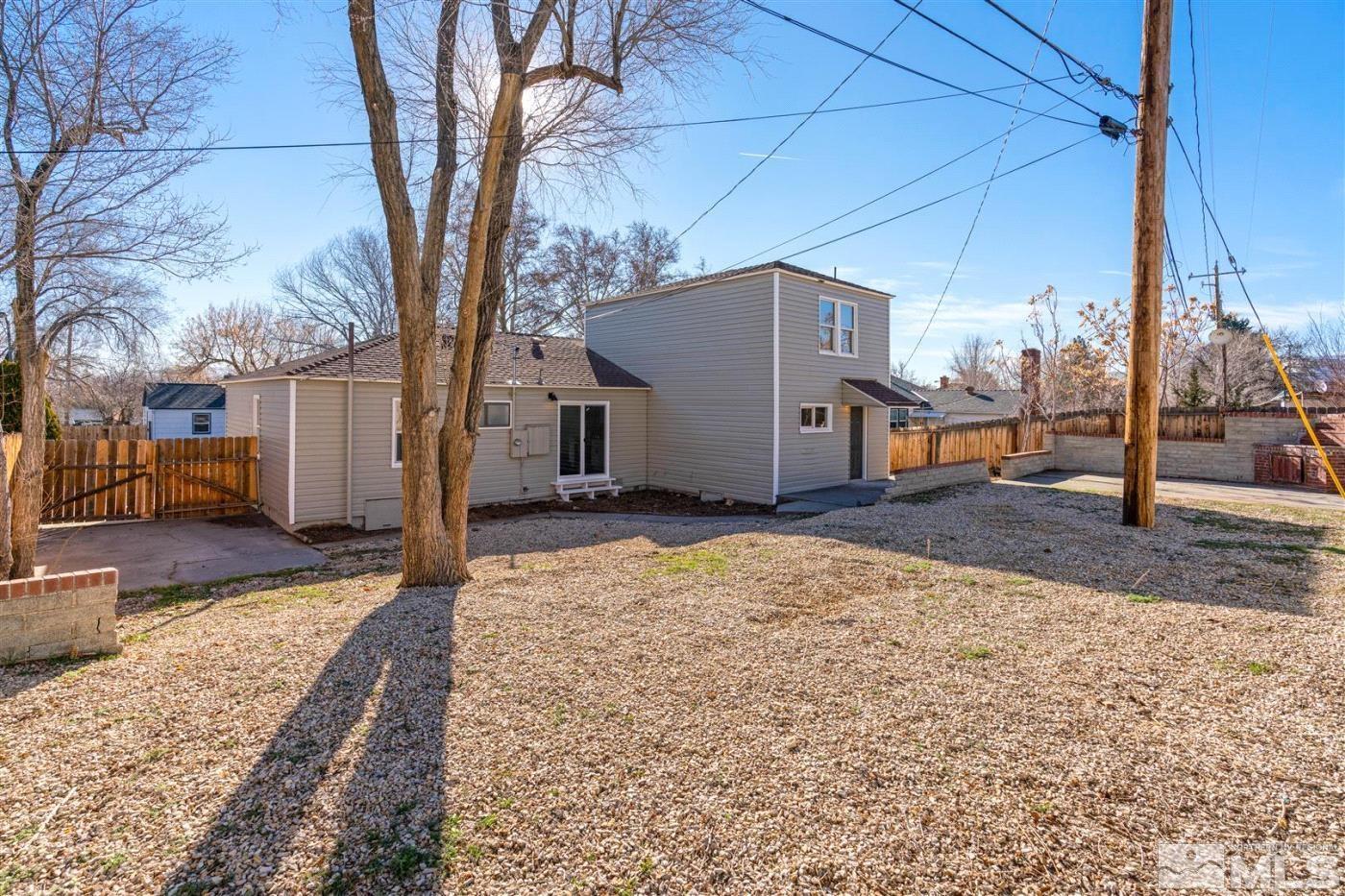 289 Bartlett Street Reno, NV 89512 - Photo 35 of 40 a house with yard in front of it