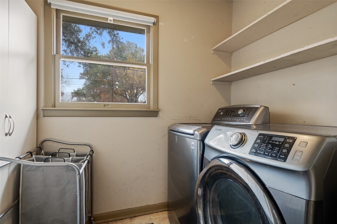 1802 Hutto Road Georgetown, TX 78626 - Photo 31 of 33 a view of storage and utility room with washer and dryer