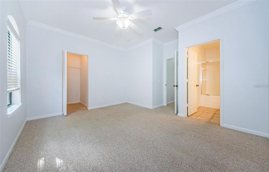 2148 Chianti Place, Unit 1310 Palm Harbor, FL 34683 - Photo 15 of 33 a view of empty room with a ceiling fan