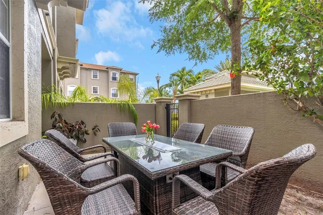 a view of an outdoor space with lounge chair