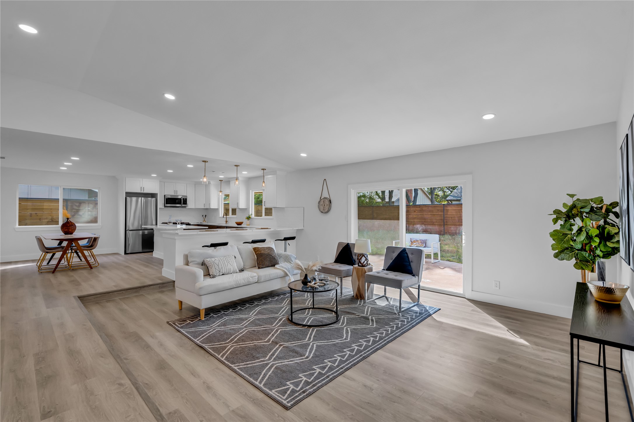 11602 Big Trail Austin, TX 78759 - Photo 7 of 27 a living room with furniture and a large window