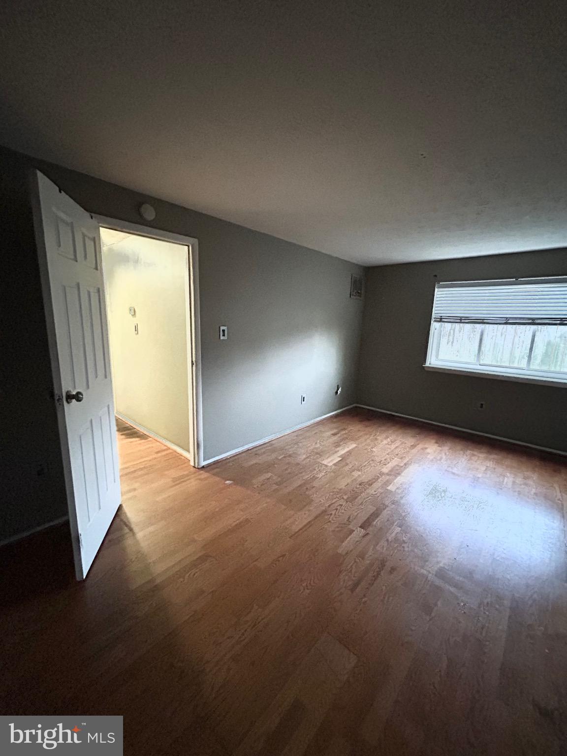 12405 Hickory Tree Way, Unit 613 Germantown, MD 20874 - Photo 21 of 22 an empty room with windows