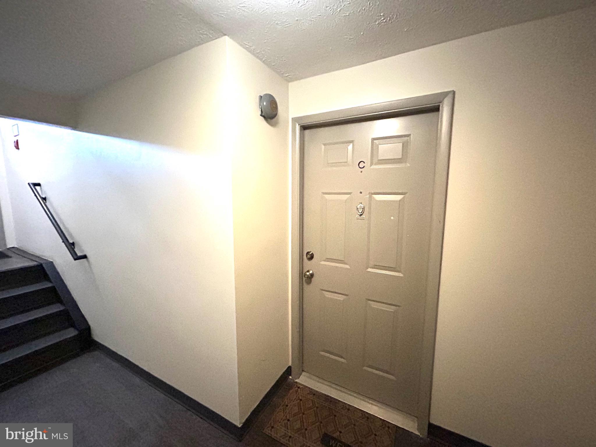 12405 Hickory Tree Way, Unit 613 Germantown, MD 20874 - Photo 9 of 22 a view of a hallway with closet