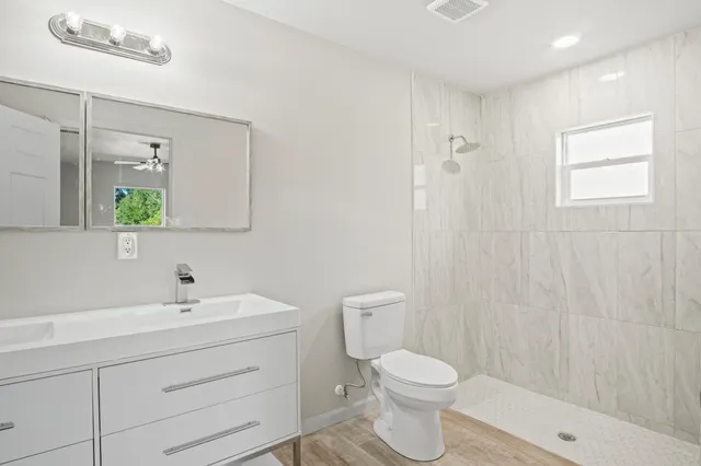 a view of a bathroom with a shower curtain