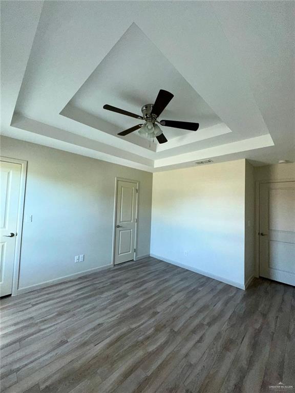 418 Newport Avenue, Unit 2 Edinburg, TX 78539 - Photo 11 of 18 a view of empty room with wooden floor