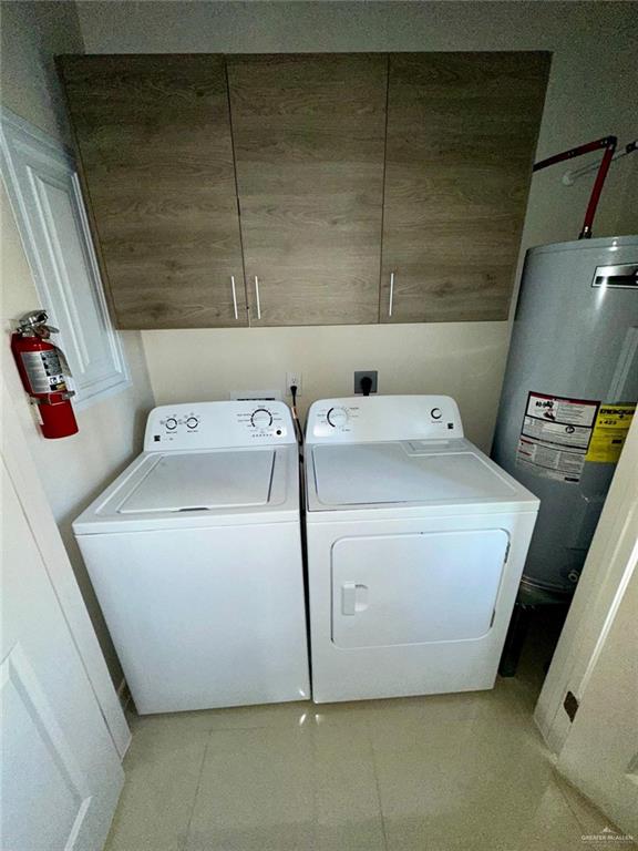 418 Newport Avenue, Unit 2 Edinburg, TX 78539 - Photo 9 of 18 a utility room with dryer and washer
