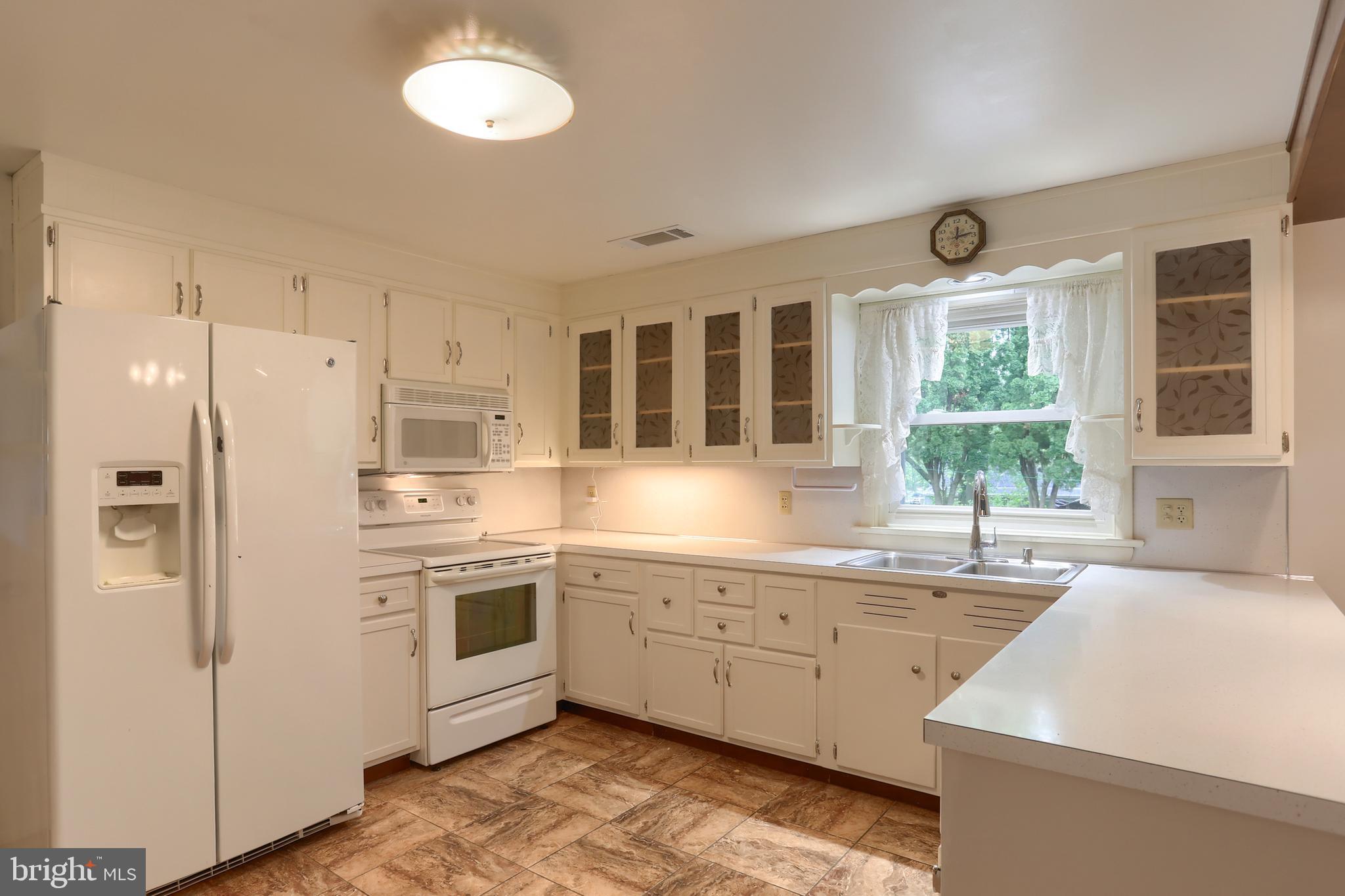 2040 Miller Road East Petersburg, PA 17520 - Photo 6 of 49 a kitchen that has a sink a window and stainless steel appliances