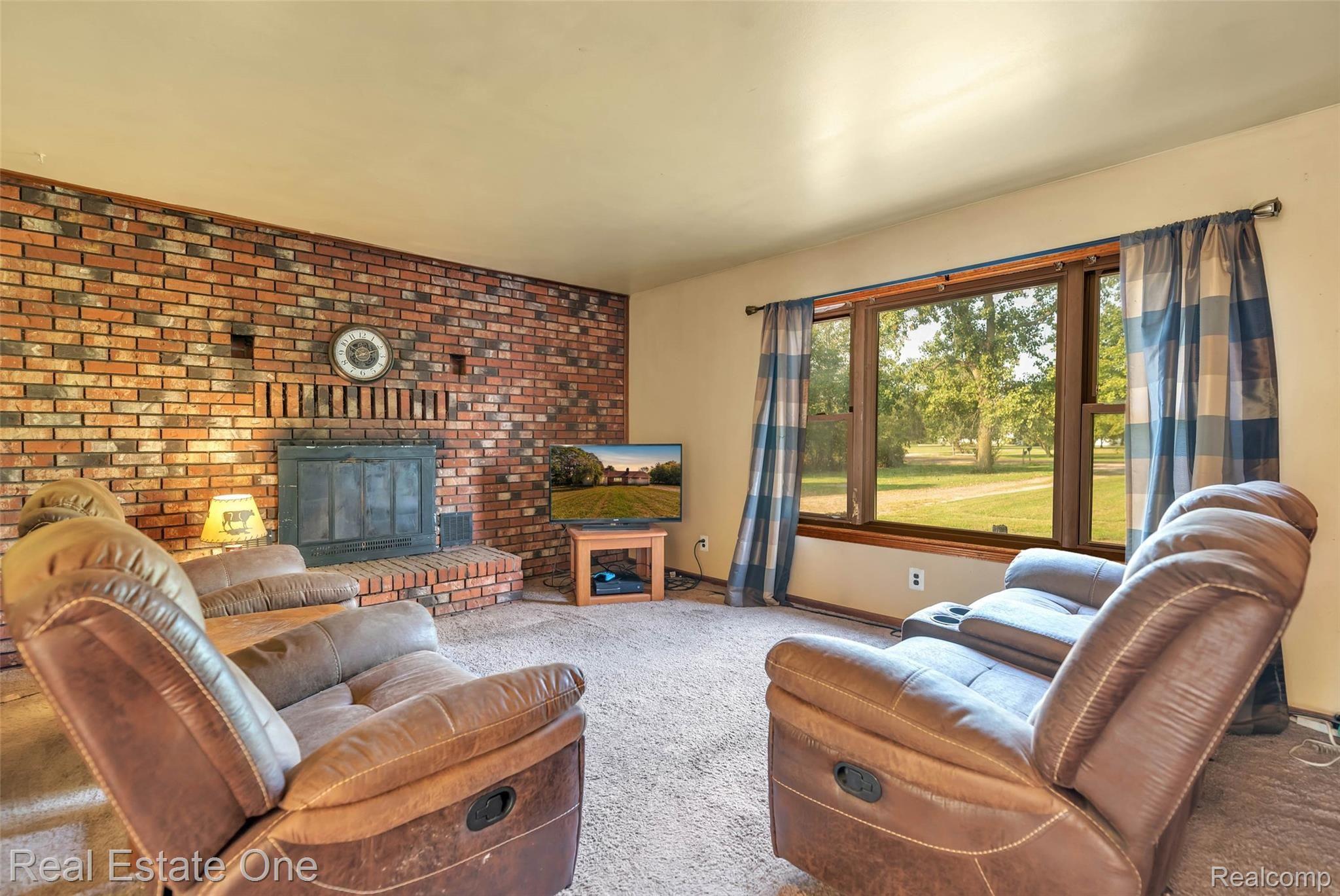 5400 North Fleming Road Fowlerville, MI 48836 - Photo 7 of 40 12-5400 Fleming Rd-WindowStill-Real.jpg
