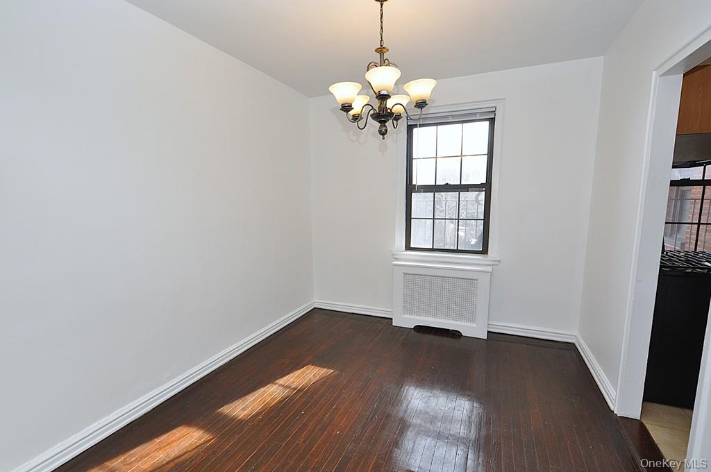 180 Garth Road, Unit 4F Scarsdale, NY 10583 - Photo 15 of 39 The separate dining room opens to the living room and can be used as a home office. The dining room is approx 10'-11" x 9'-4".
