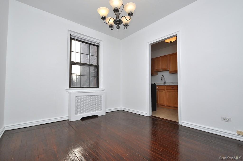 180 Garth Road, Unit 4F Scarsdale, NY 10583 - Photo 16 of 39 The separate dining room opens to the living room and can be used as a home office. The dining room is approx 10'-11" x 9'-4".