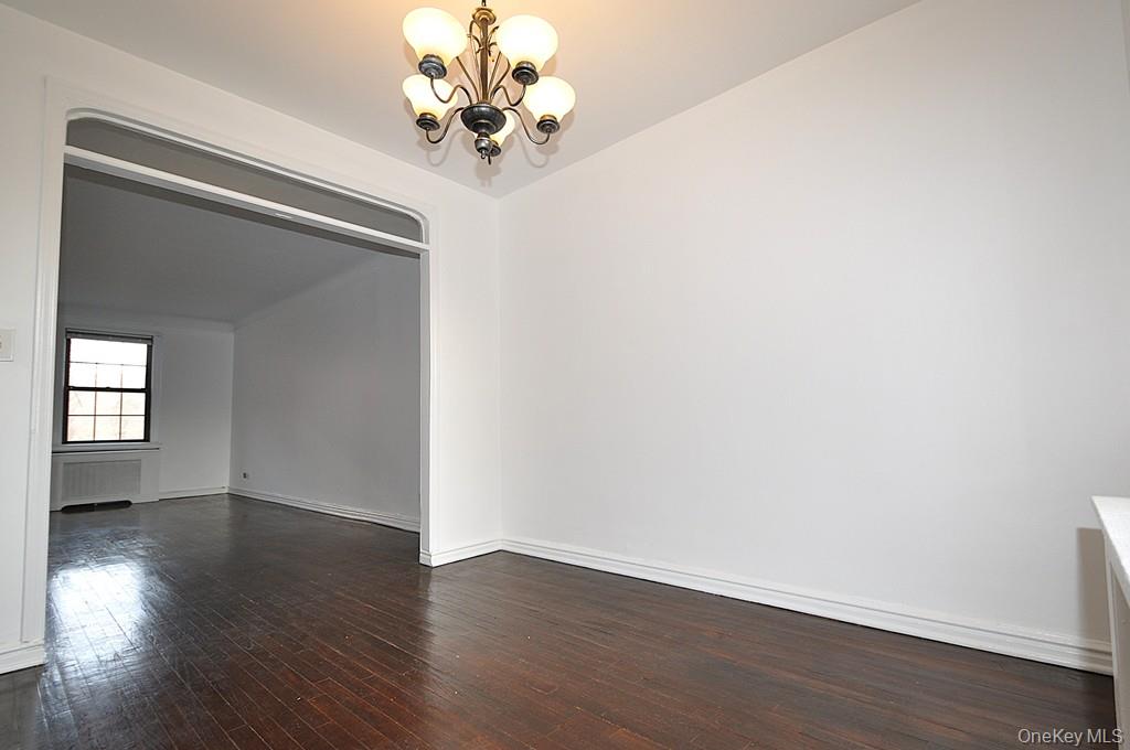 180 Garth Road, Unit 4F Scarsdale, NY 10583 - Photo 18 of 39 The separate dining room opens to the living room and can be used as a home office. The dining room is approx 10'-11" x 9'-4".