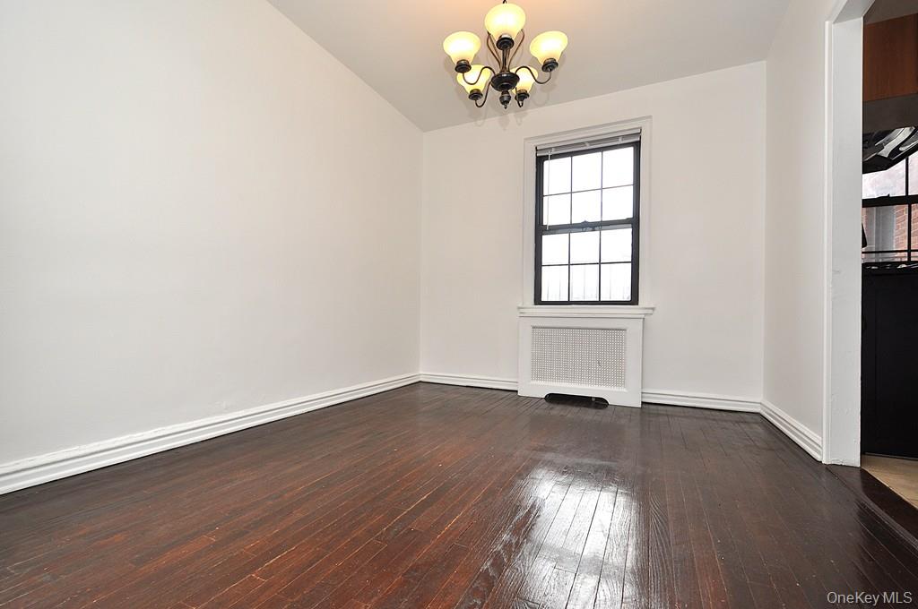 180 Garth Road, Unit 4F Scarsdale, NY 10583 - Photo 19 of 39 The separate dining room opens to the living room and can be used as a home office. The dining room is approx 10'-11" x 9'-4".