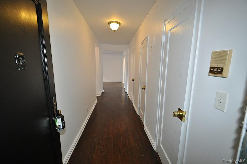 180 Garth Road, Unit 4F Scarsdale, NY 10583 - Photo 26 of 39 Entry hallway has three large closets (one Walk-in) and is a great place to display your fine artwork.