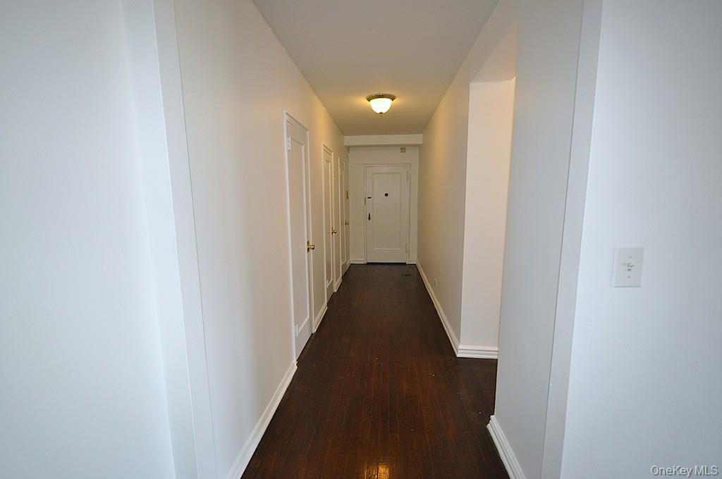 180 Garth Road, Unit 4F Scarsdale, NY 10583 - Photo 27 of 39 Entry hallway has three large closets (one Walk-in) and is a great place to display your fine artwork.
