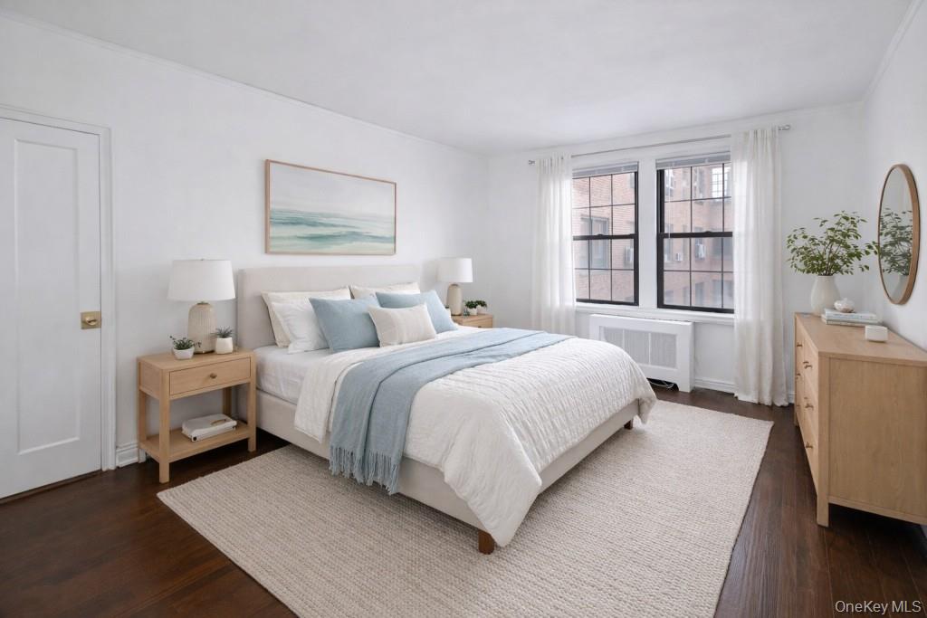 180 Garth Road, Unit 4F Scarsdale, NY 10583 - Photo 3 of 39 Photo Visually Staged. Bedroom overlooks the manicured courtyard and has hardwood floors. The bedroom is approx. 14'-10" x 10'-11".