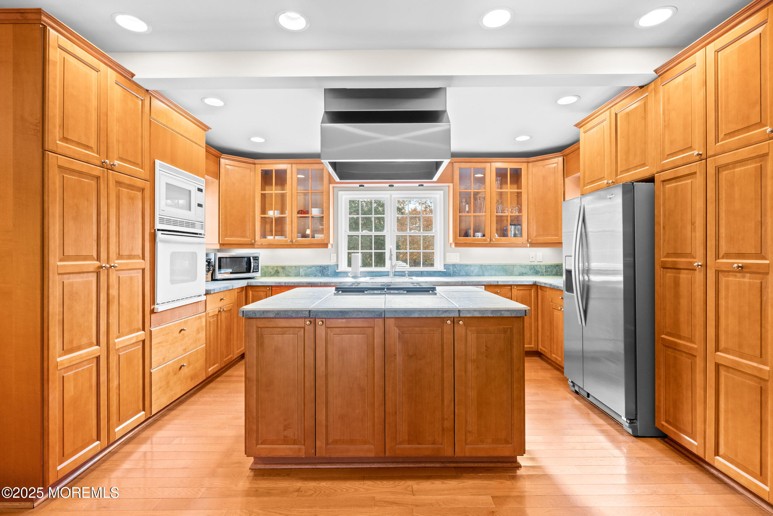 603 West Farms Road Howell, NJ 07731 - Photo 11 of 38 a kitchen with stainless steel appliances granite countertop a refrigerator a sink and dishwasher with wooden floor