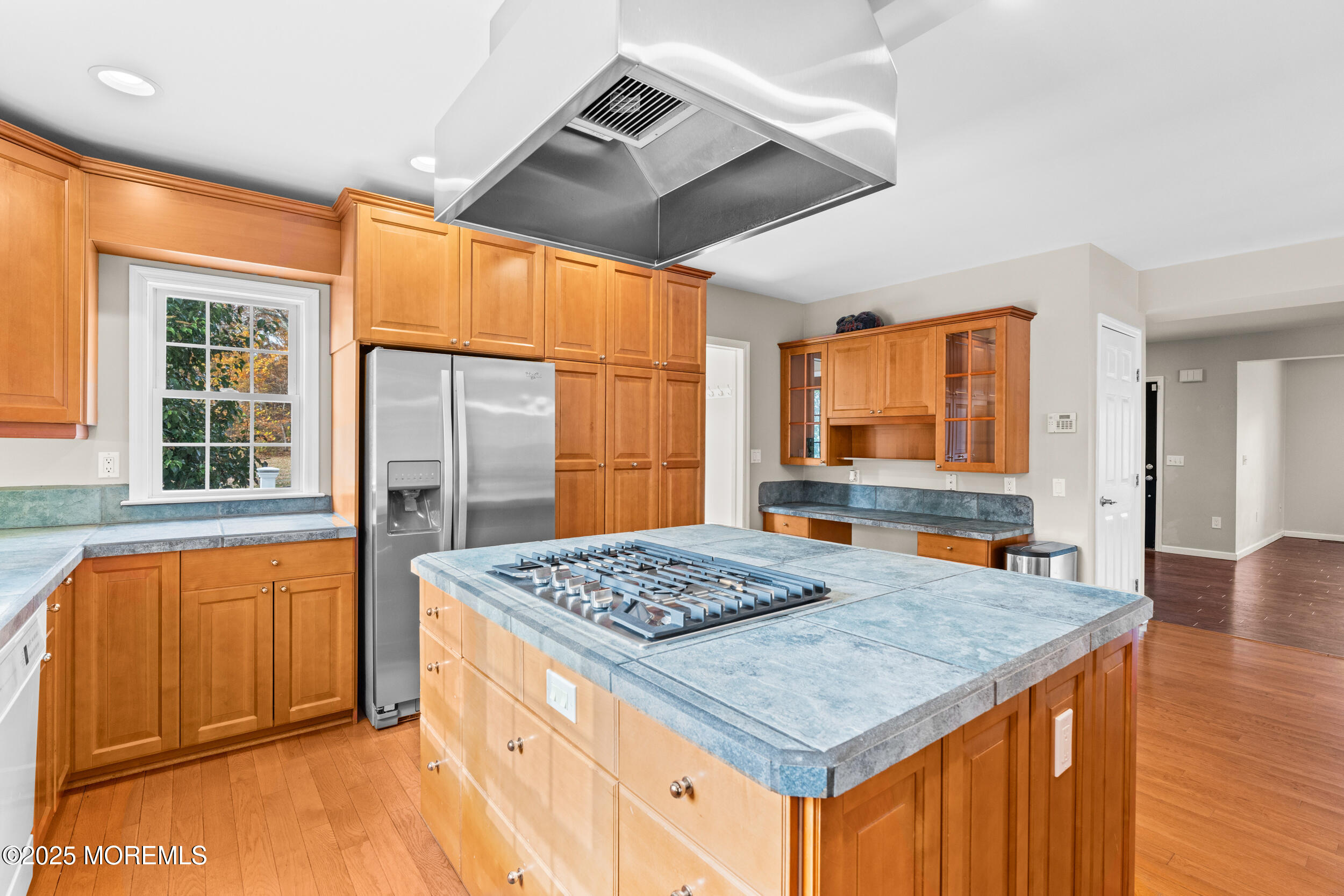 603 West Farms Road Howell, NJ 07731 - Photo 15 of 38 a kitchen that has a stove and a table in it