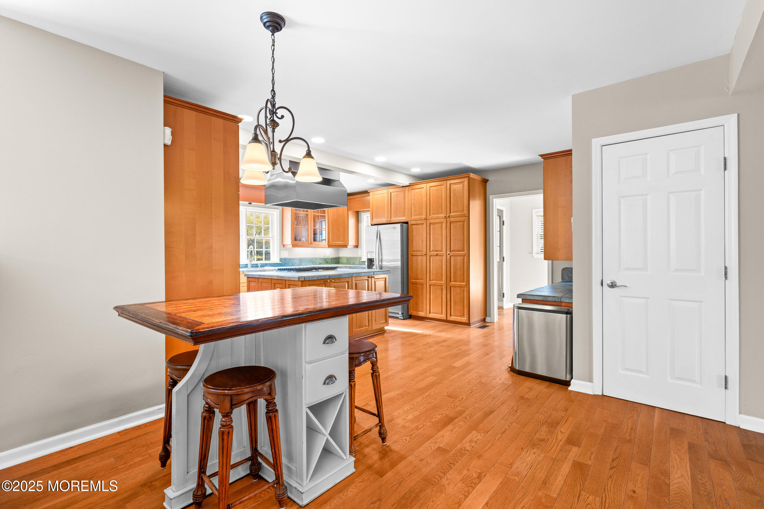 603 West Farms Road Howell, NJ 07731 - Photo 16 of 38 a view of a dining room with furniture window and wooden floor