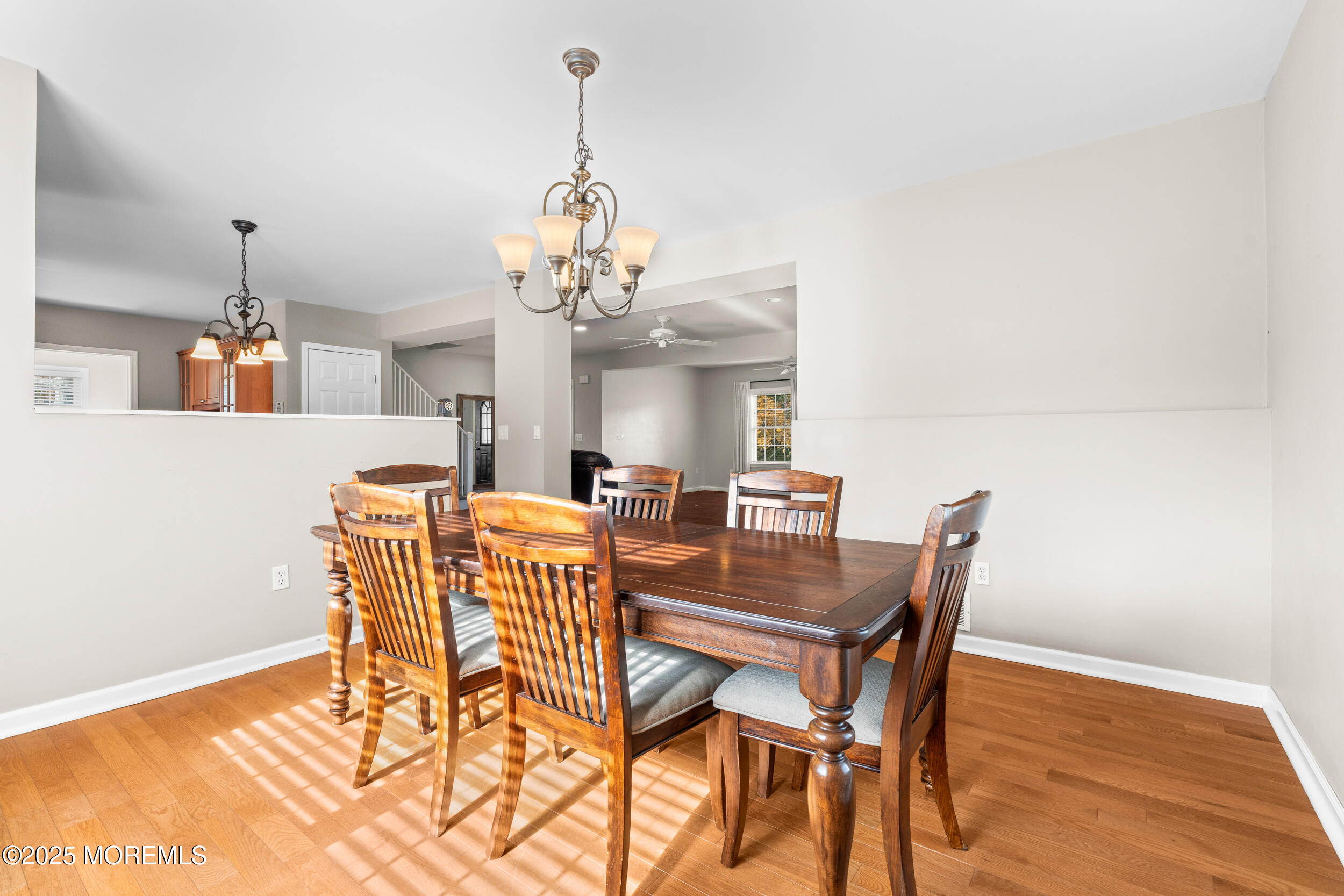 603 West Farms Road Howell, NJ 07731 - Photo 18 of 38 a view of a dining room with furniture and chandelier