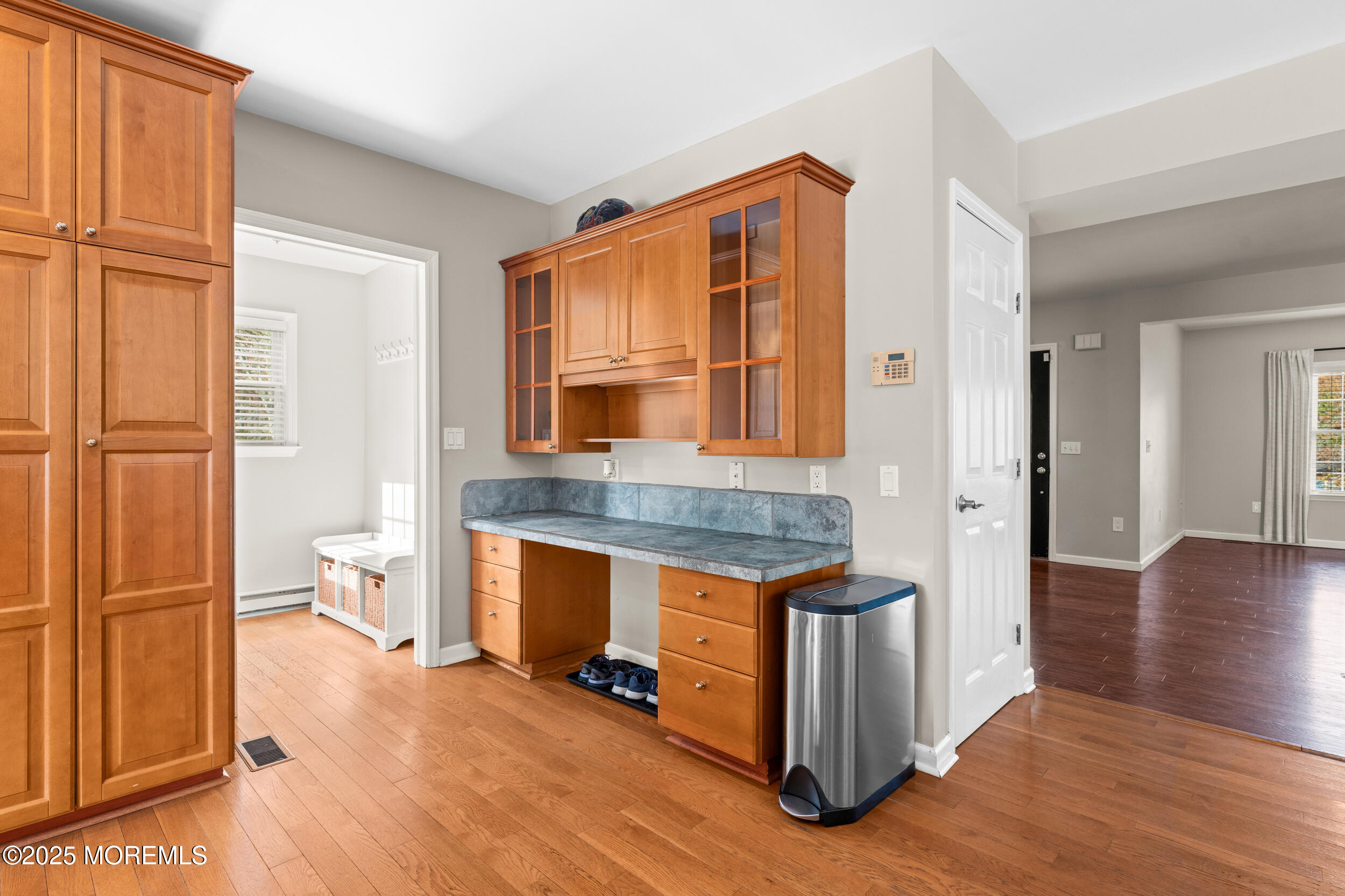 603 West Farms Road Howell, NJ 07731 - Photo 20 of 38 wooden floor in an empty room with a stove and a window