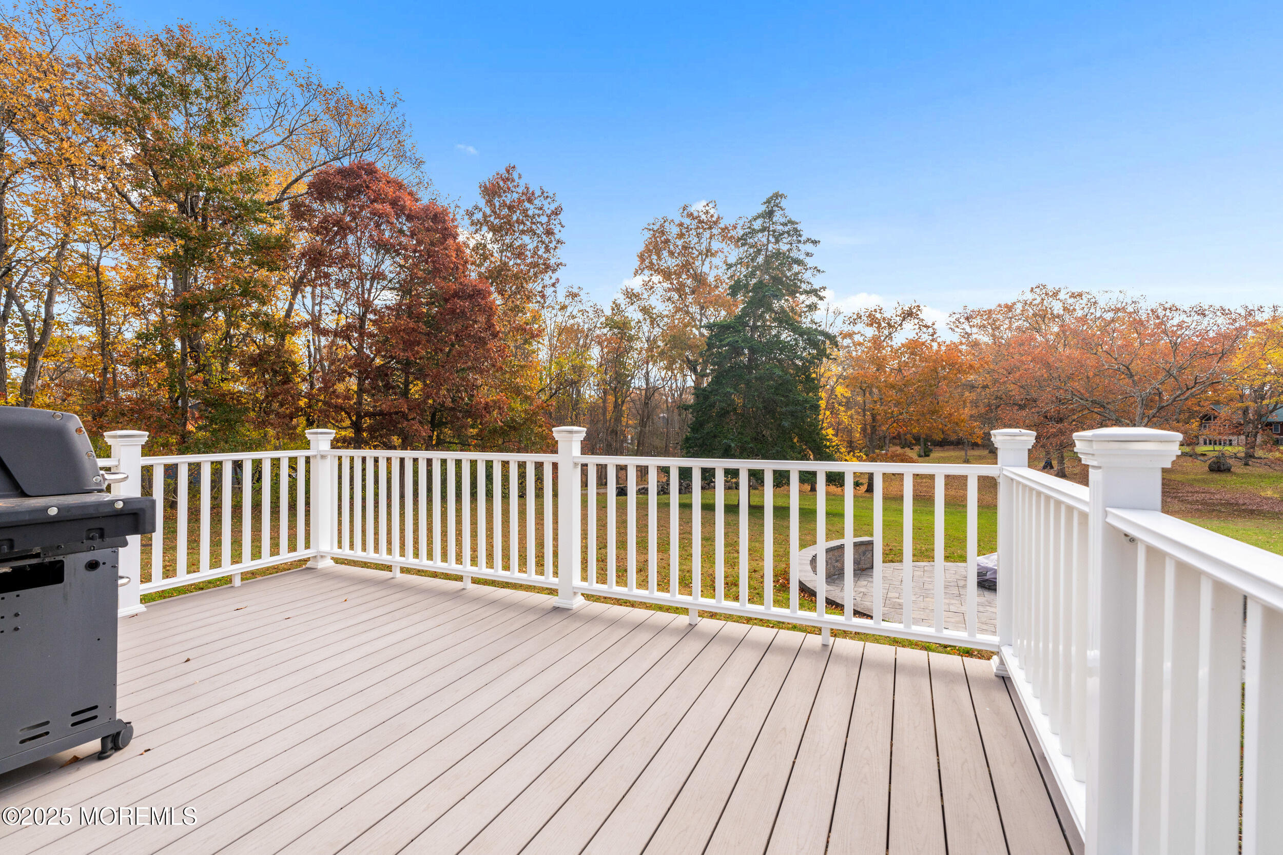 603 West Farms Road Howell, NJ 07731 - Photo 22 of 38 a view of balcony with wooden floor and fence