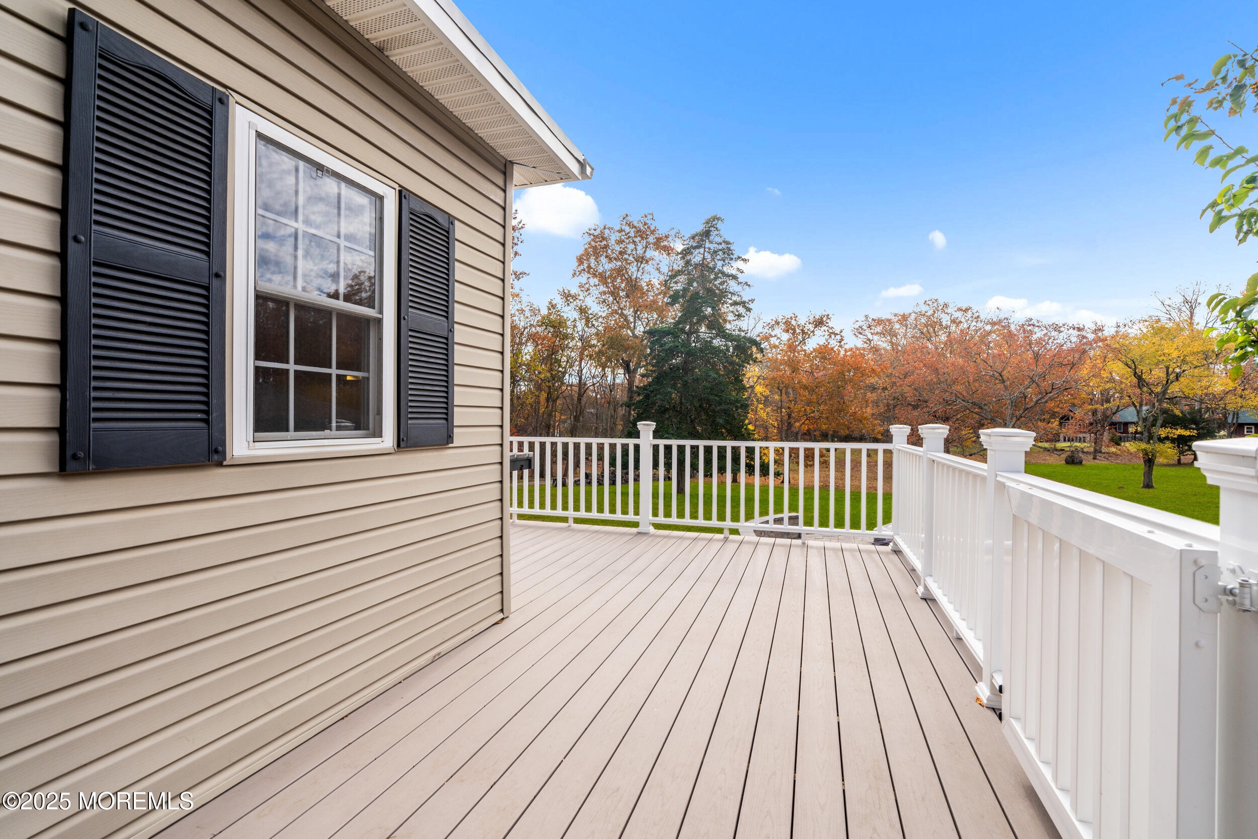 603 West Farms Road Howell, NJ 07731 - Photo 23 of 38 a view of a balcony with wooden floor