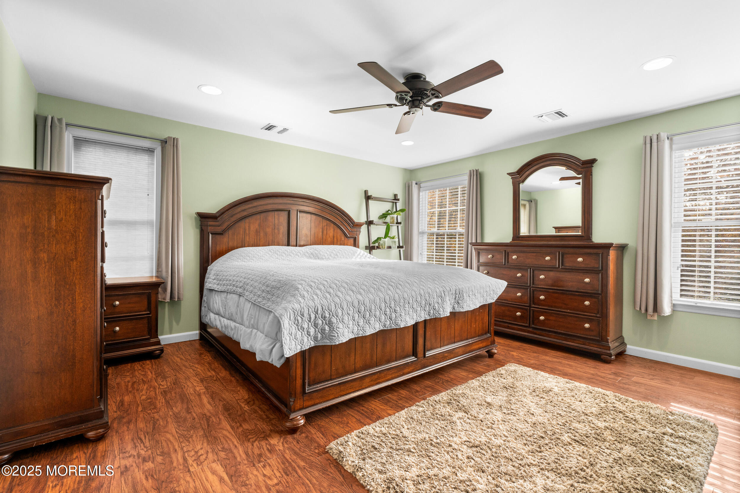 603 West Farms Road Howell, NJ 07731 - Photo 25 of 38 a bedroom with a bed and a dresser