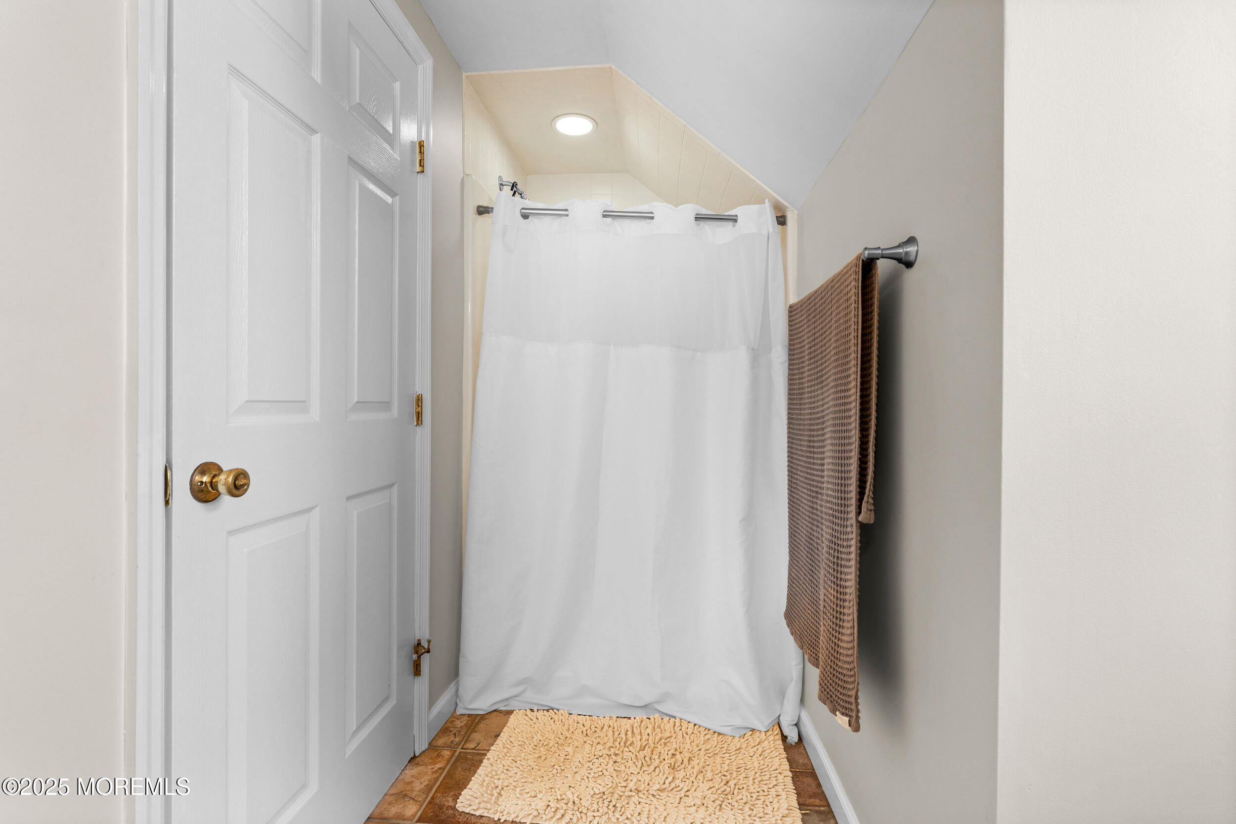 603 West Farms Road Howell, NJ 07731 - Photo 28 of 38 a bathroom with a shower and a tub
