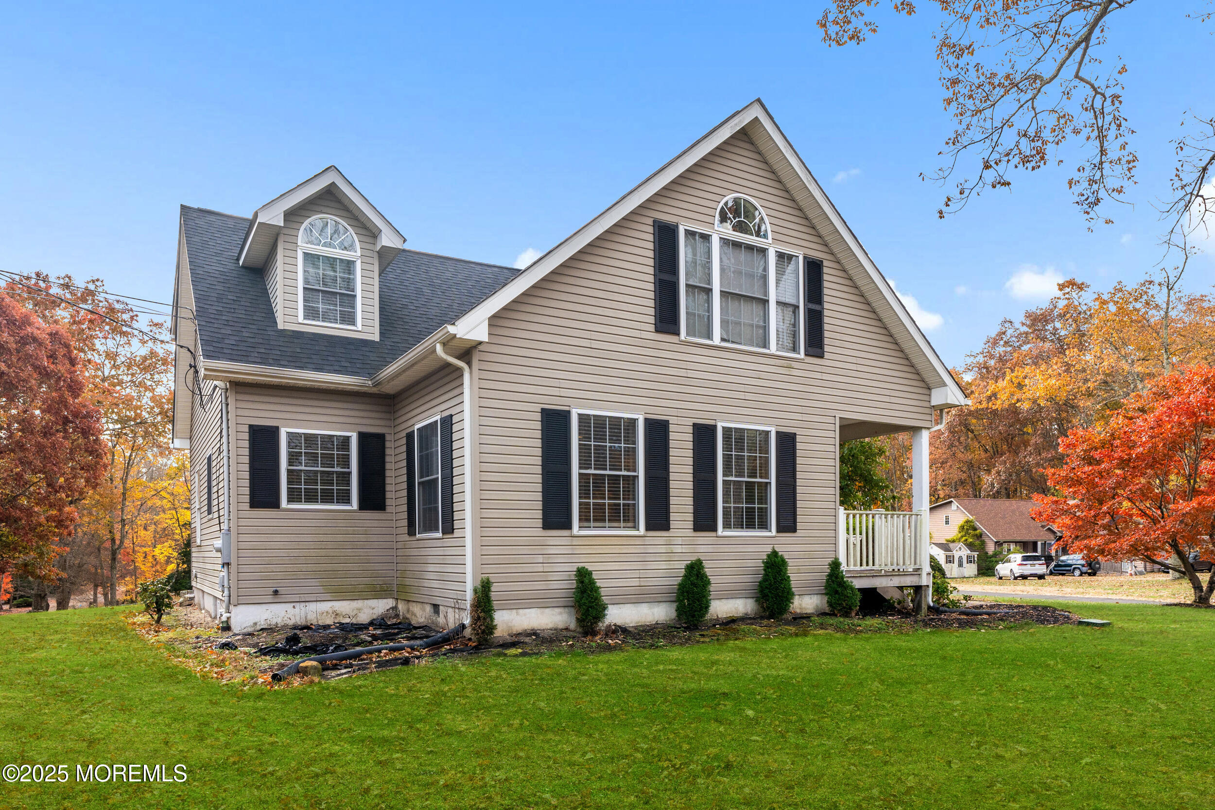 603 West Farms Road Howell, NJ 07731 - Photo 3 of 38 a front view of a house with a yard