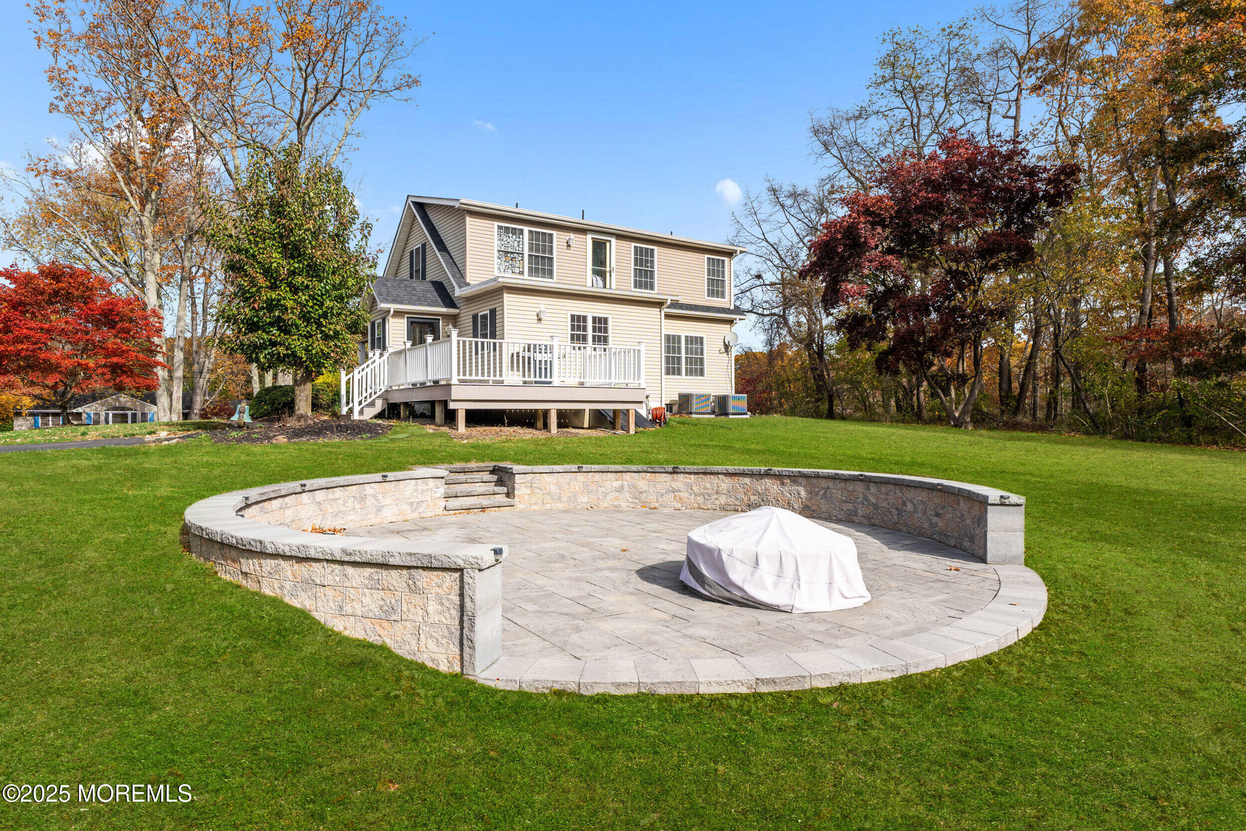 603 West Farms Road Howell, NJ 07731 - Photo 33 of 38 a view of a house with a big yard and palm trees