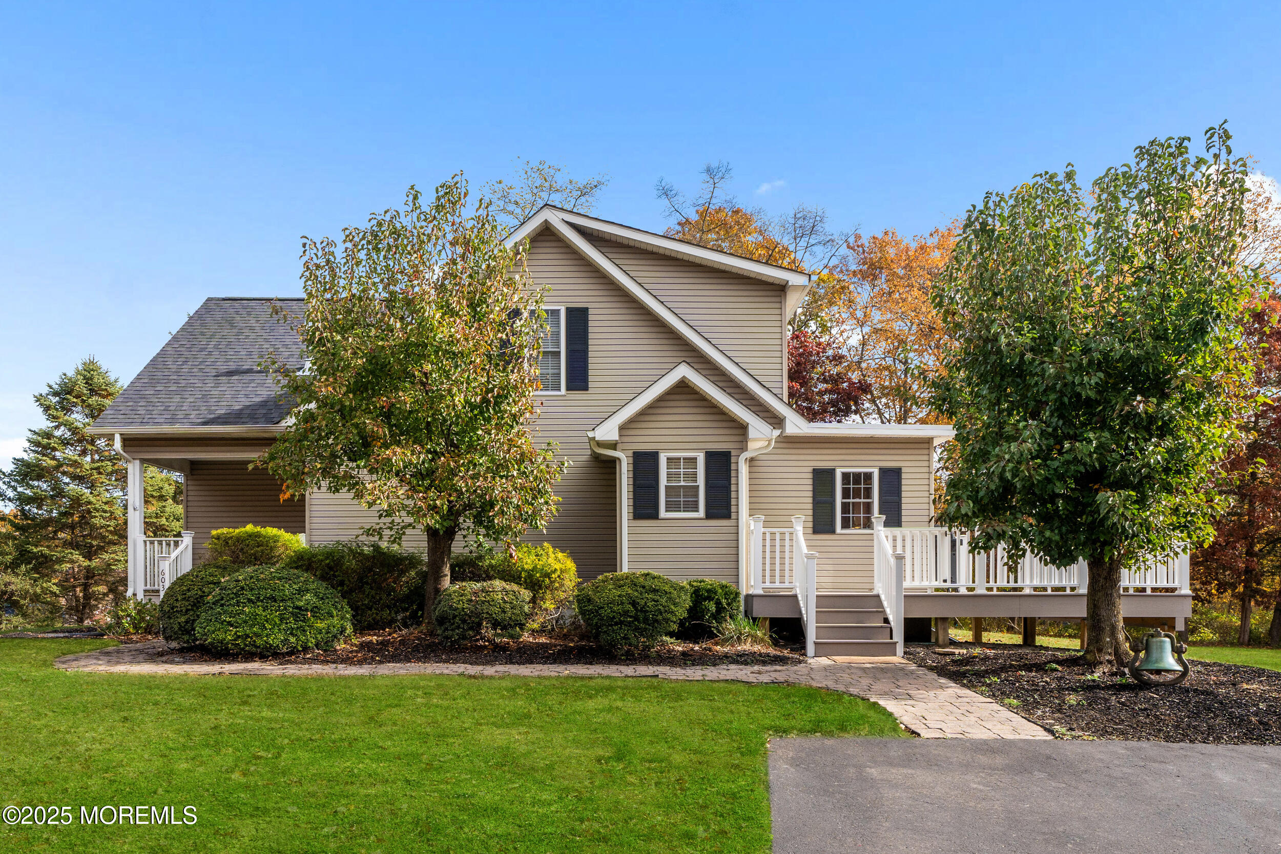603 West Farms Road Howell, NJ 07731 - Photo 38 of 38 a front view of a house with a yard