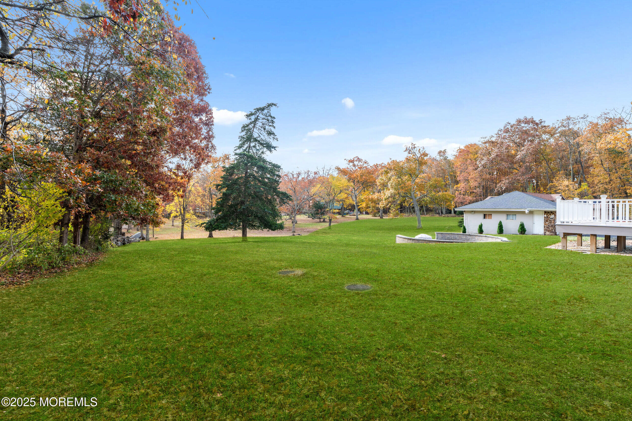603 West Farms Road Howell, NJ 07731 - Photo 5 of 38 a view of a house with a garden