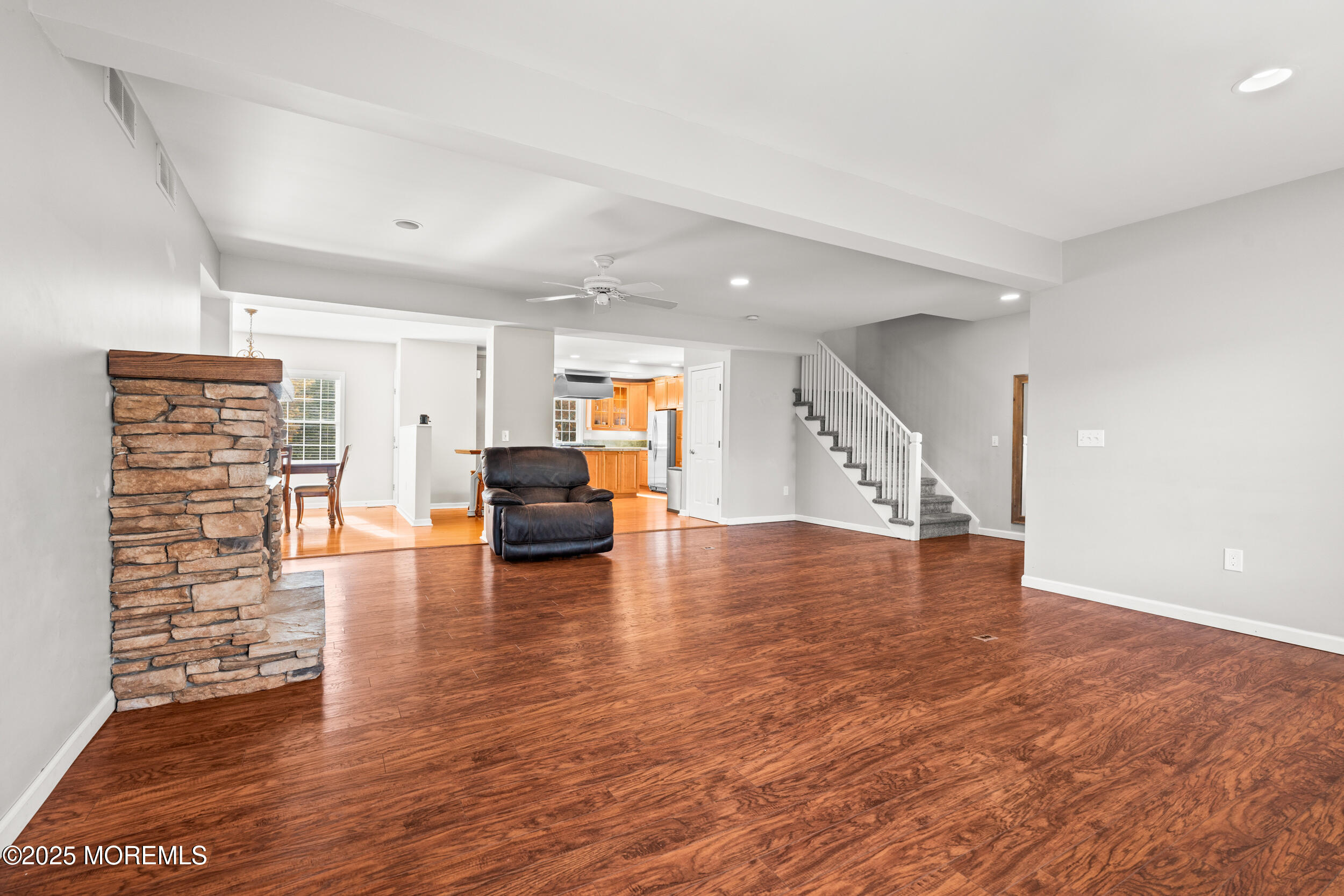 603 West Farms Road Howell, NJ 07731 - Photo 10 of 38 a living room with furniture and a large window