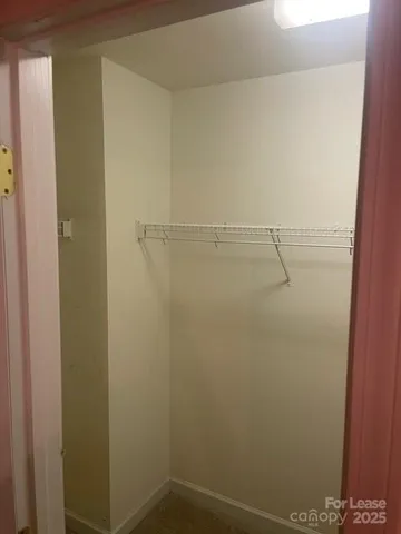 a view of a room with racks on the wall